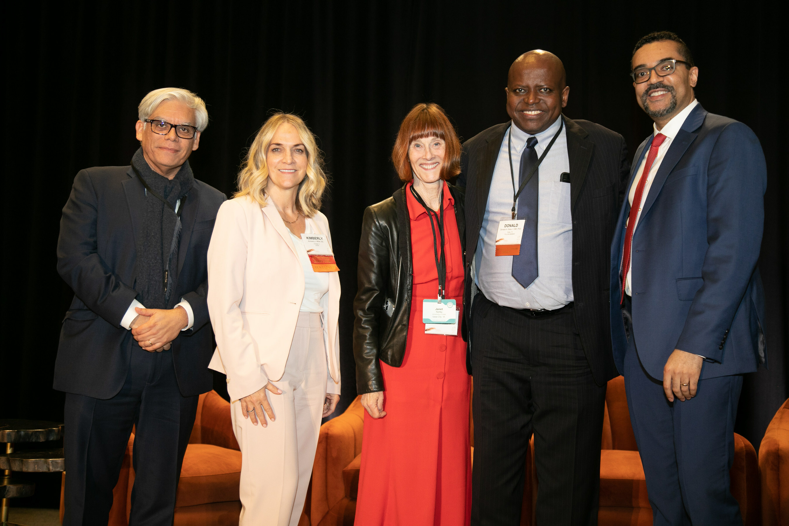 SOCS Presidents united, pictured from left: Drs. Andrew F. Alexis (current SOCS President) with Past Presidents through the years: Drs. Rebat Halder, Valerie M. Harvey, Valerie D. Callender, Founder Susan C. Taylor, Amy McMichael, Lynn McKinley-Grant, Seemal R. Desai and President-Elect Victoria Barbosa.